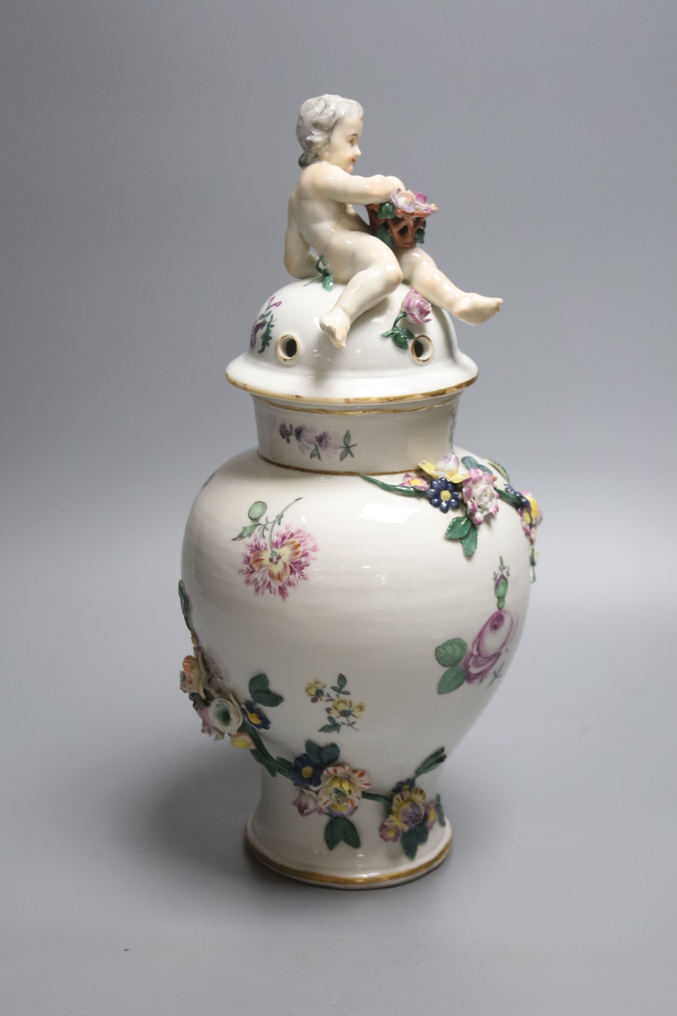 A late 18th century German porcelain pot pourri vase and cover, in Meissen style, height 32cm